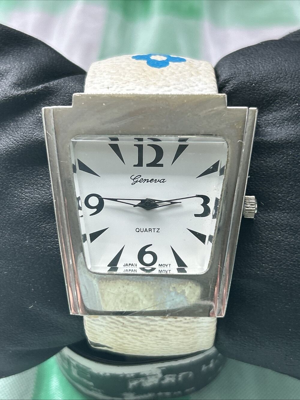 Geneva Silver Tone Multicolored Band Women’s Cuff Watch